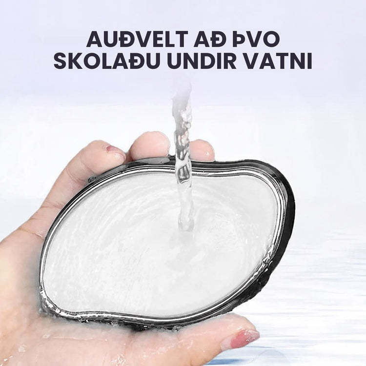 Kristalsháreyðirinn skolaður undir vatni